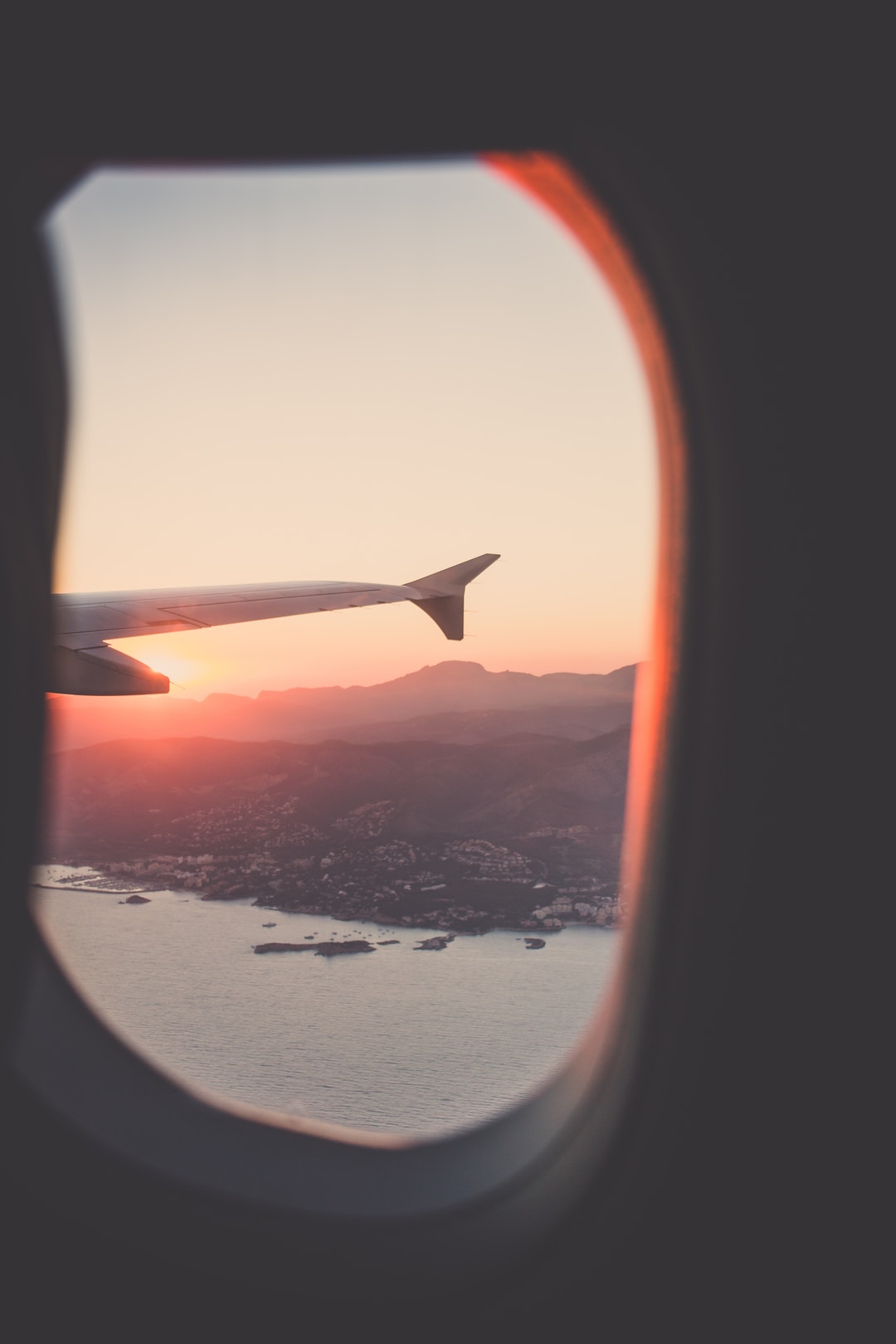 A sunset shore of Majorca, Spain viewed from an airplane window