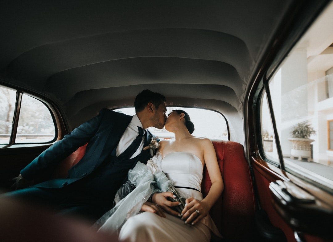 groom kissing bride