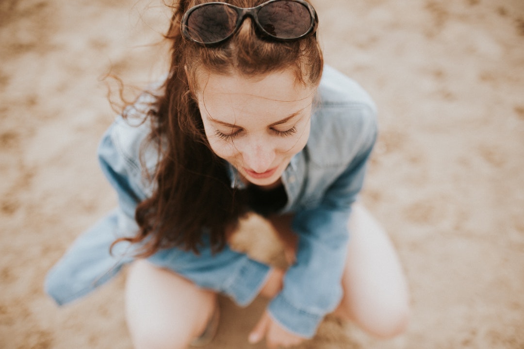 woman kneeling outdoor