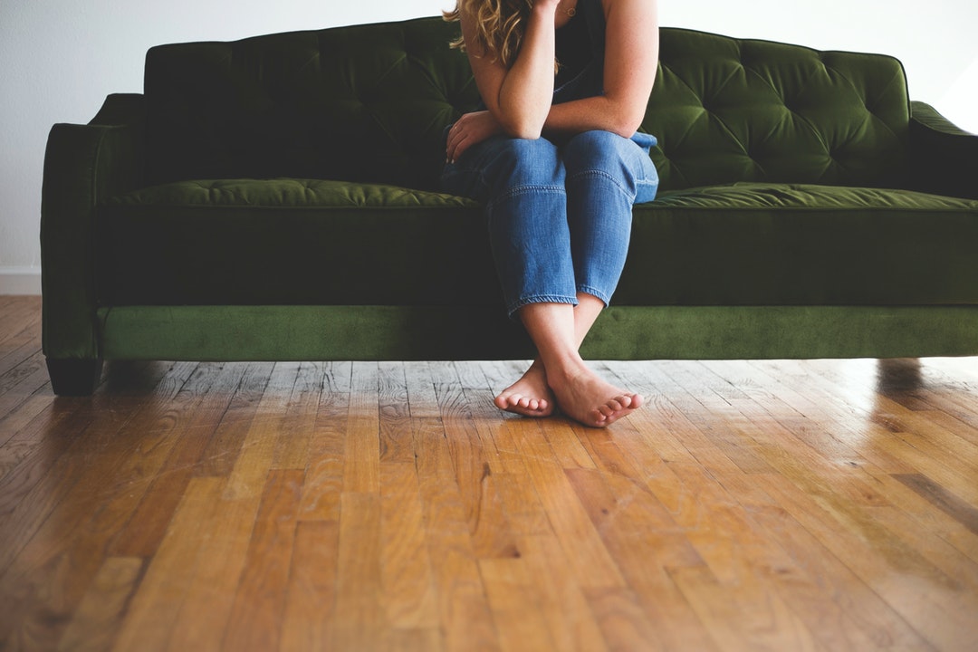 person sitting on couch