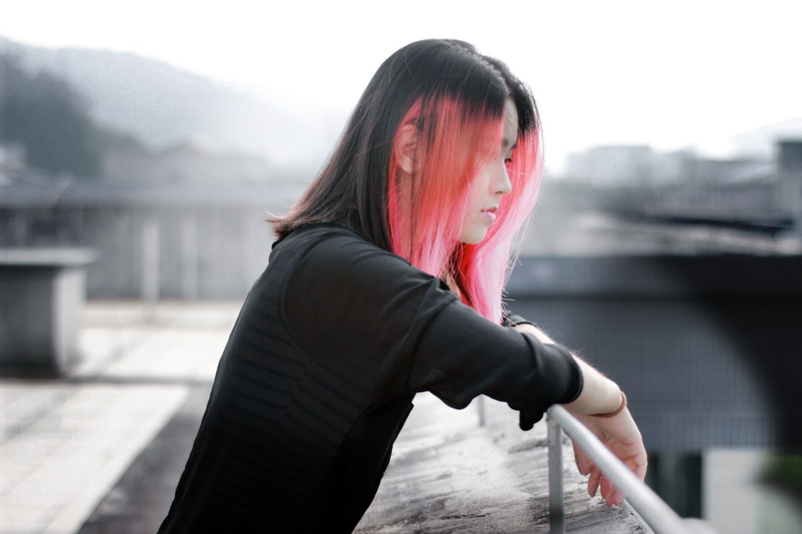 girl with pink hair on roofdeck