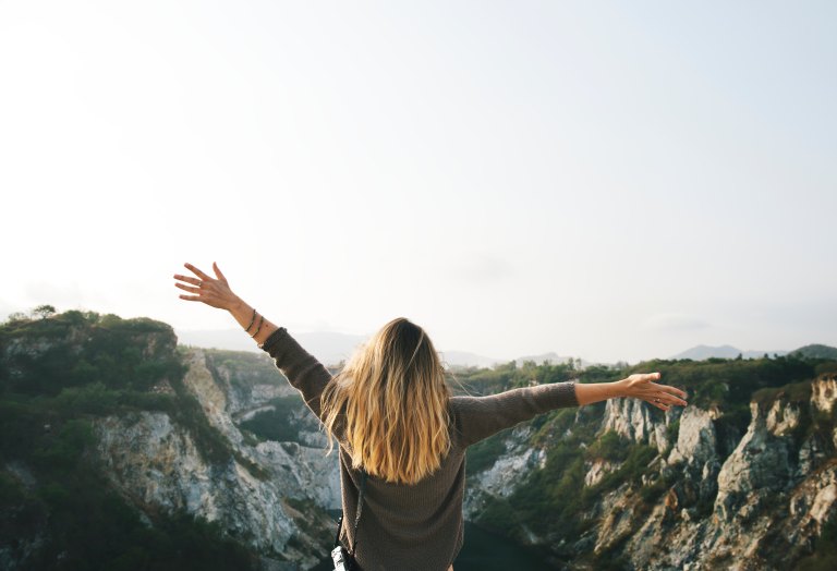 woman free in the mountains