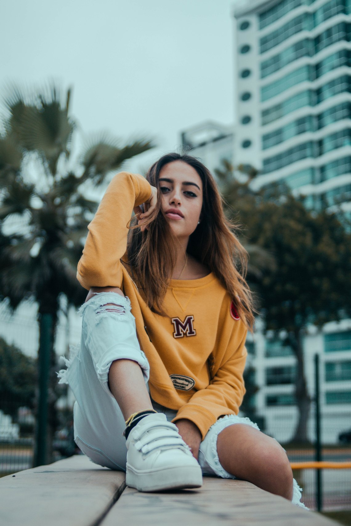 woman sitting on bench