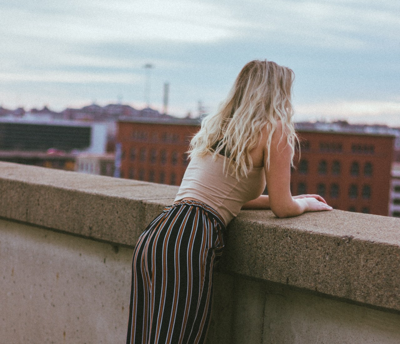 girl looking over ledge, stop making excuses, no excuses