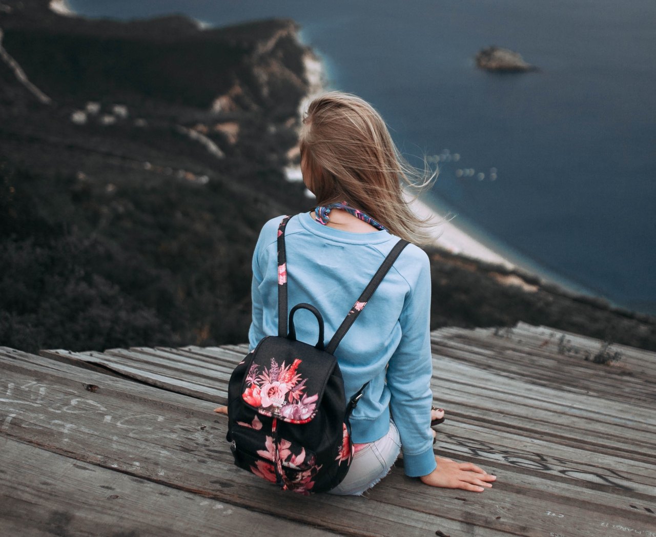 girl sitting alone