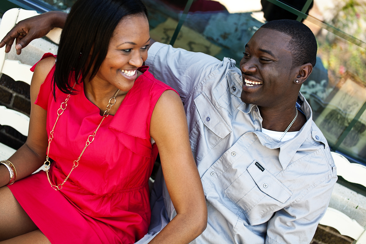 couple sitting looking happy