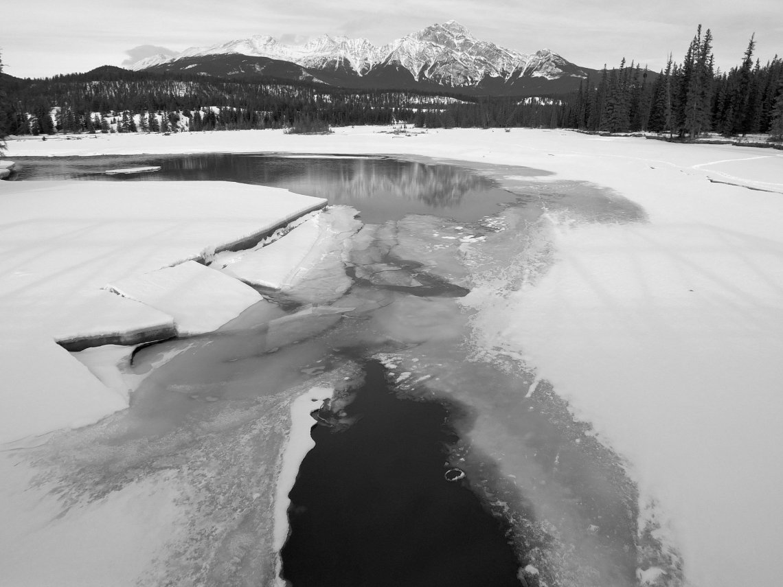 frozen lake black and white