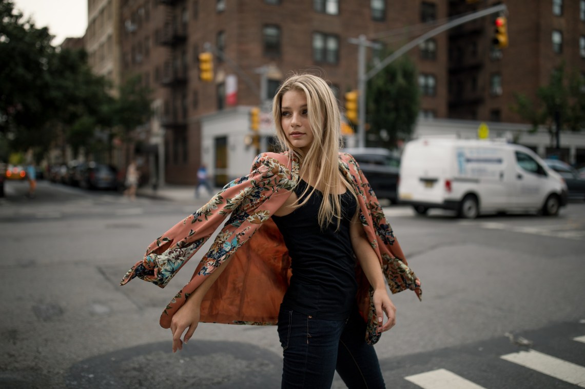 pretty woman crossing the street