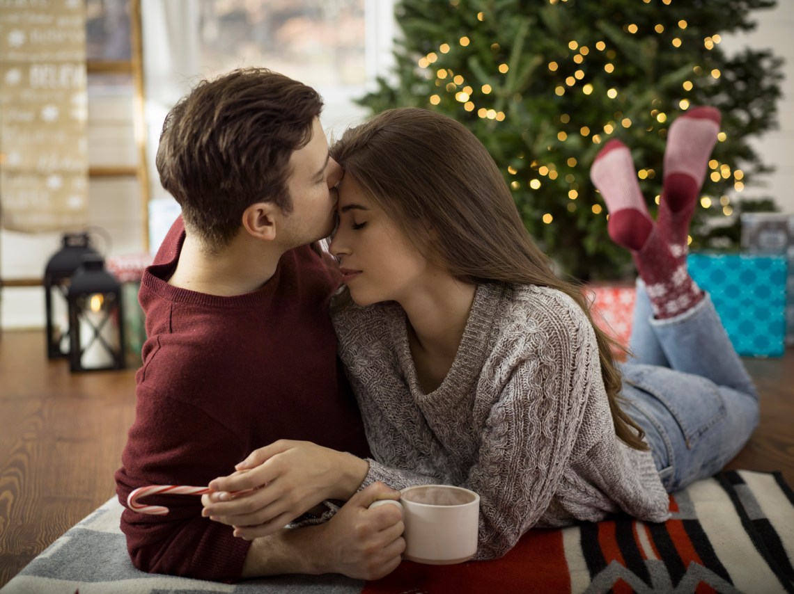 cute couple kissing forehead