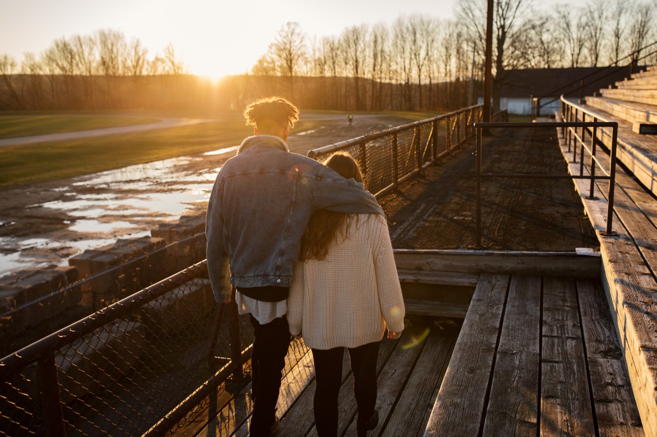 couple walking into the sunset