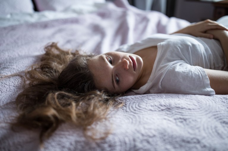 girl laying in bed