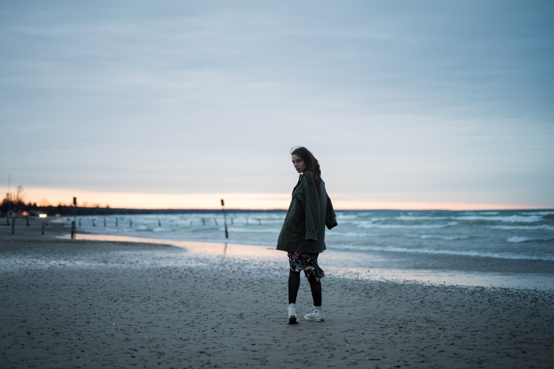 woman standing on beach