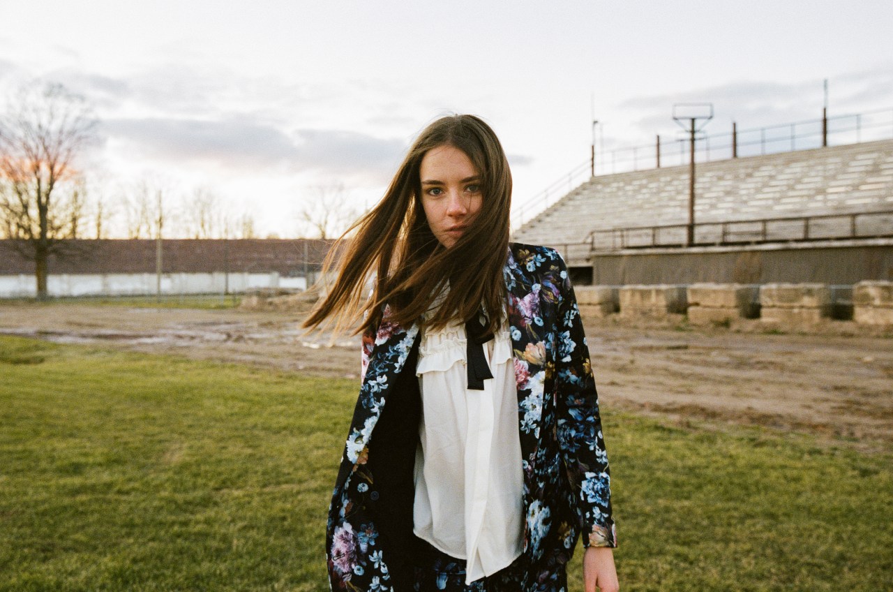 woman standing in field