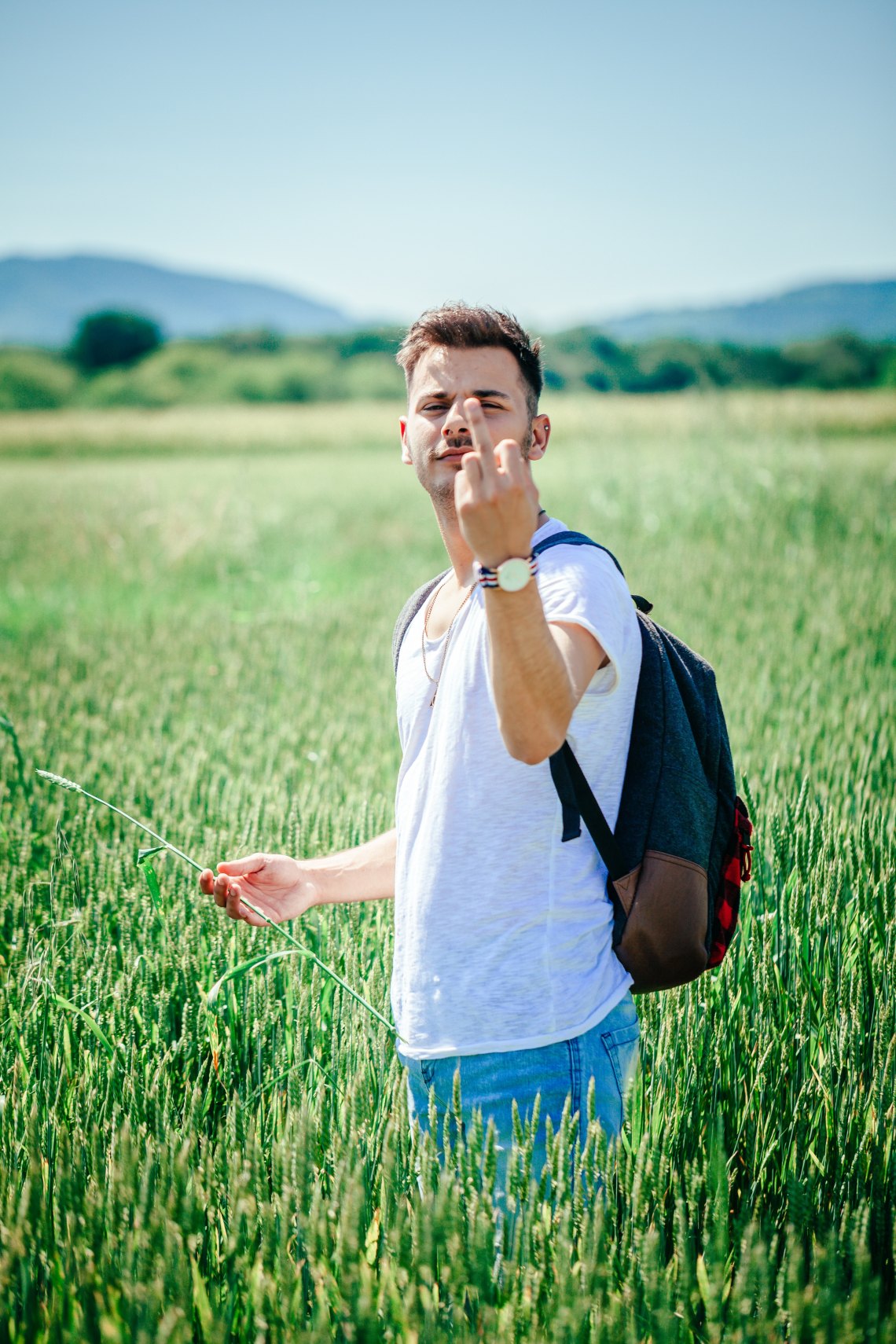 man with middle finger