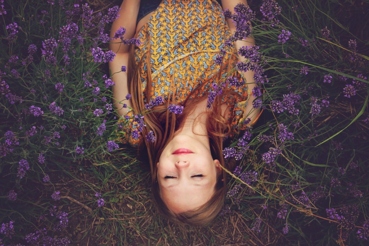 woman lying in flowers