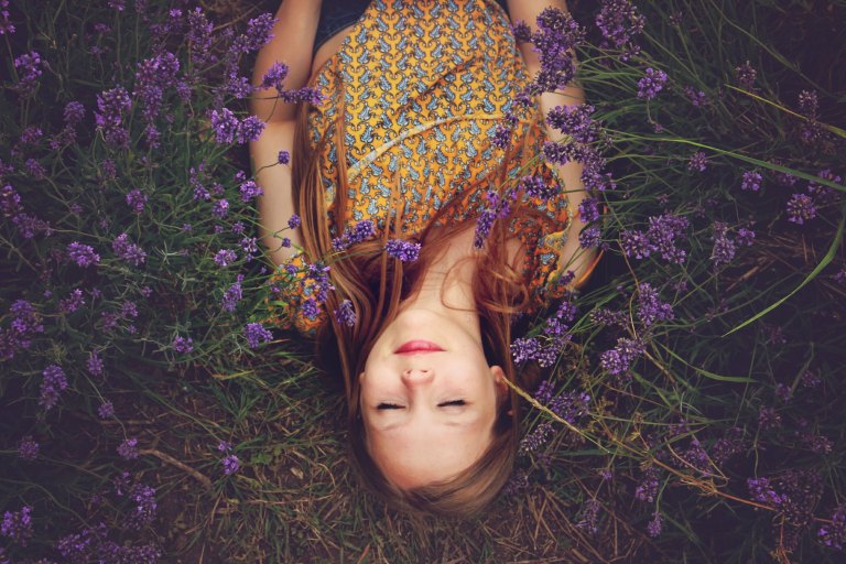 woman lying in flowers