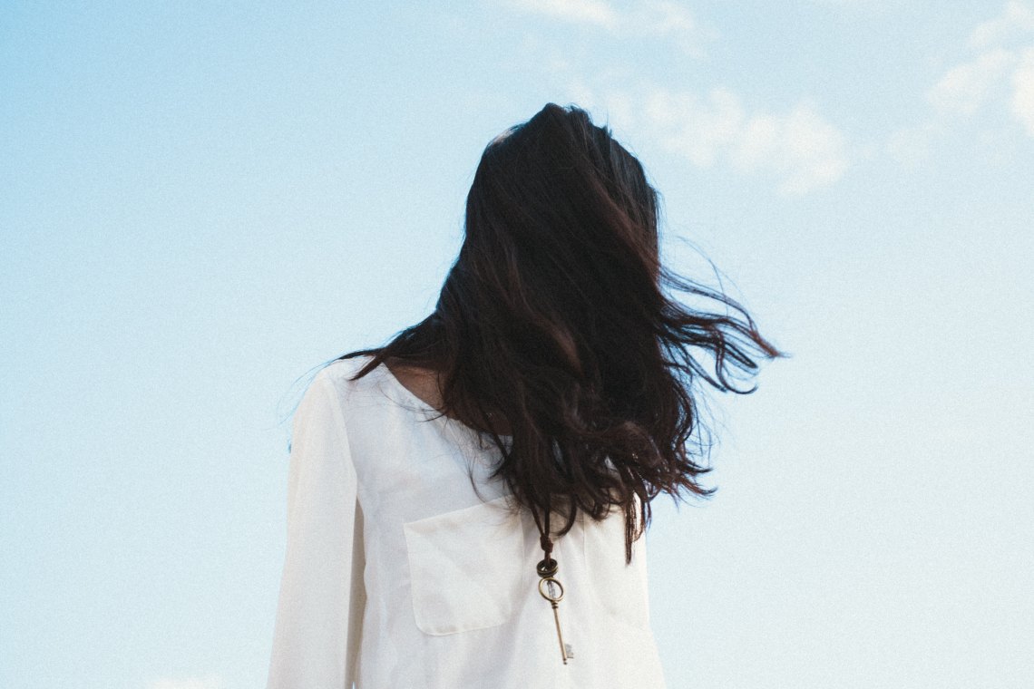 woman standing in wind