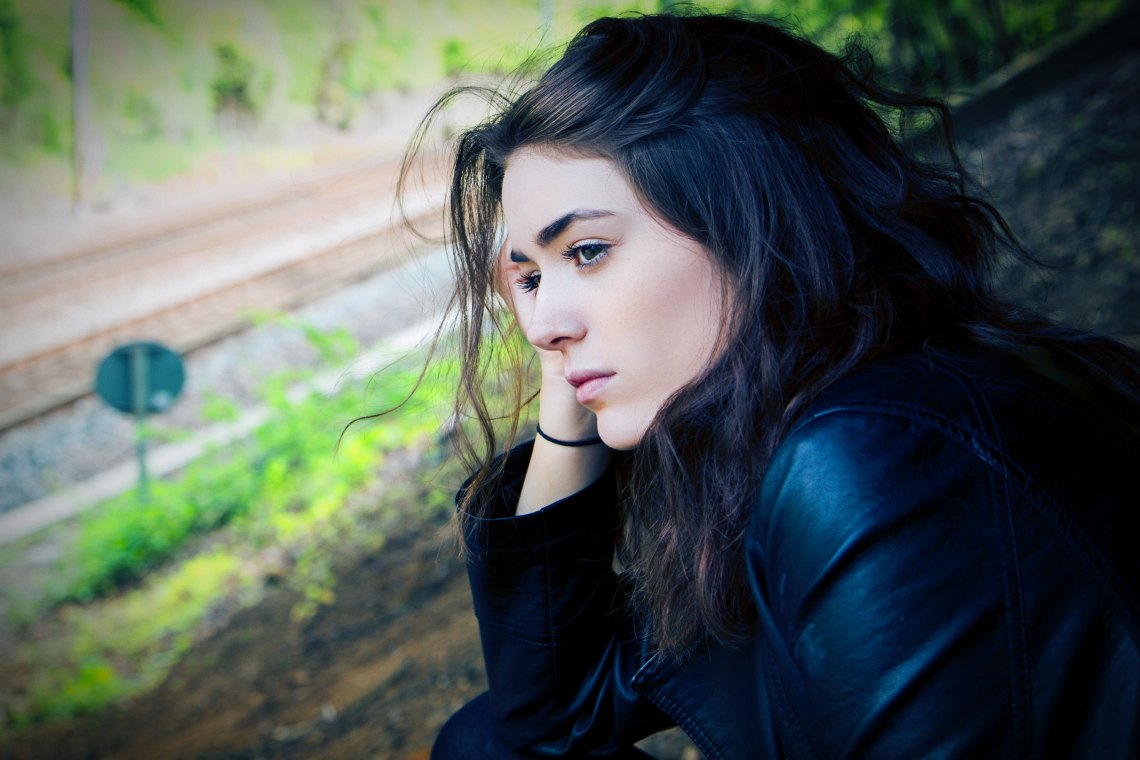 woman sitting and thinking