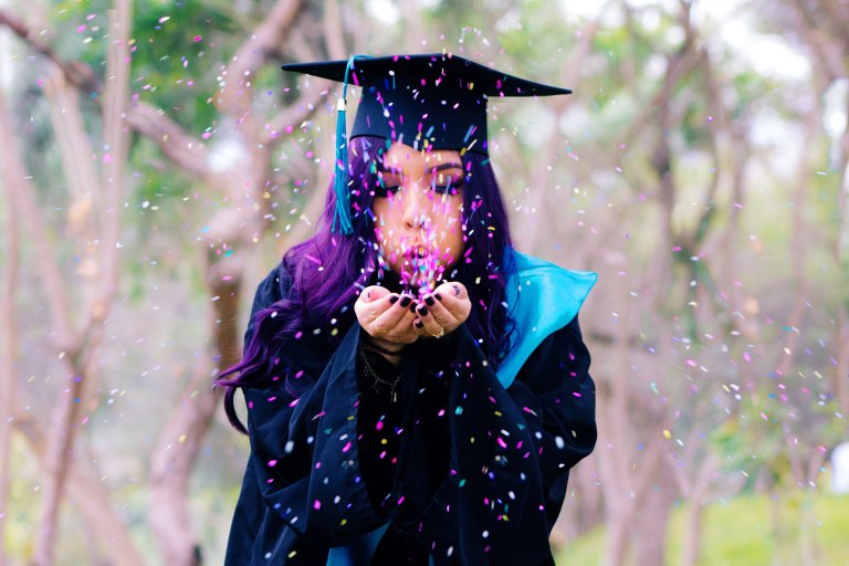 woman in graduation outfit