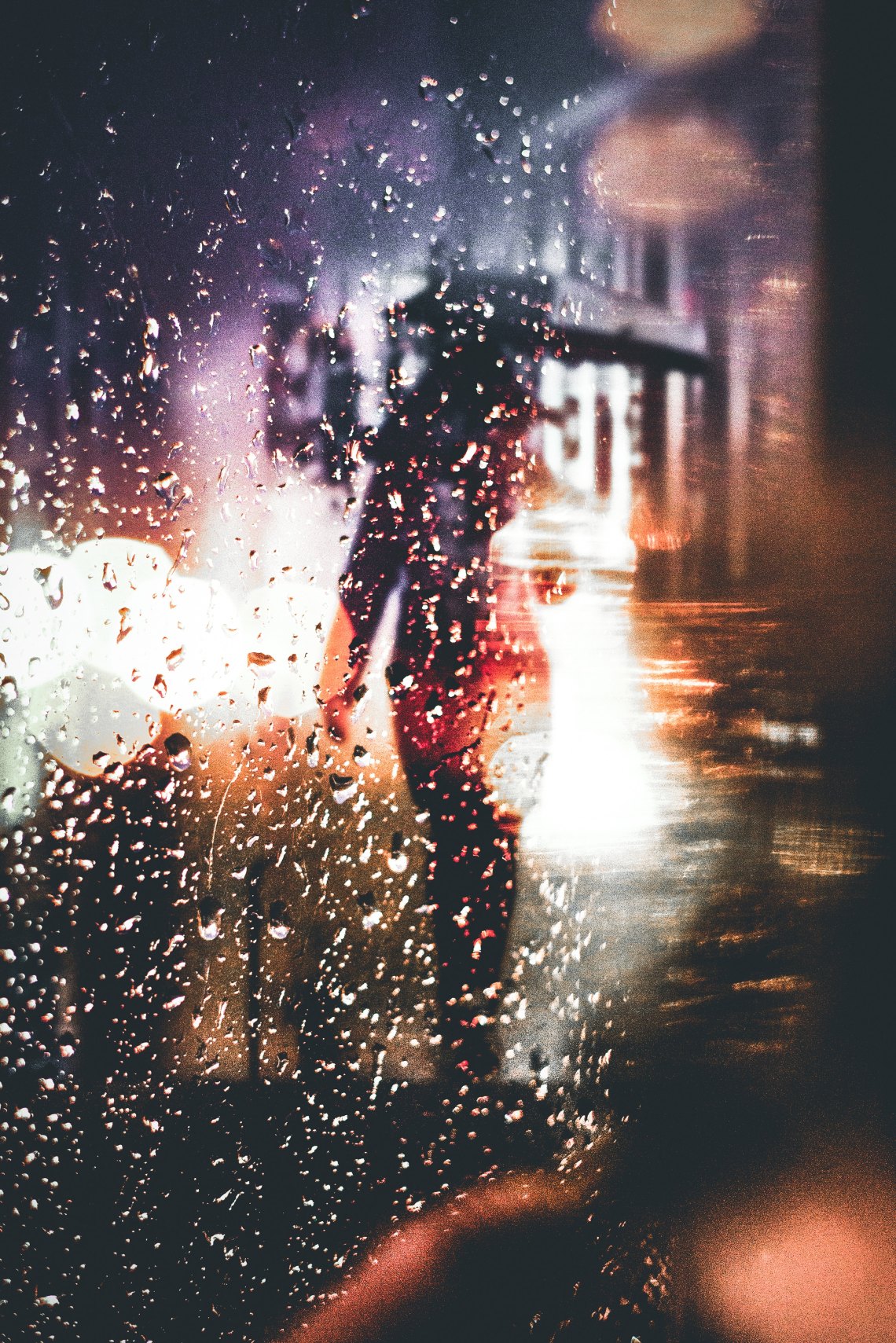 person walking in rain