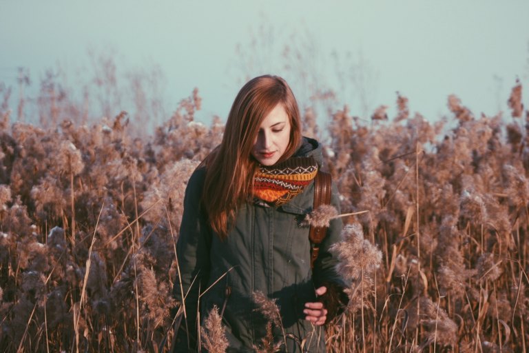 woman standing in field