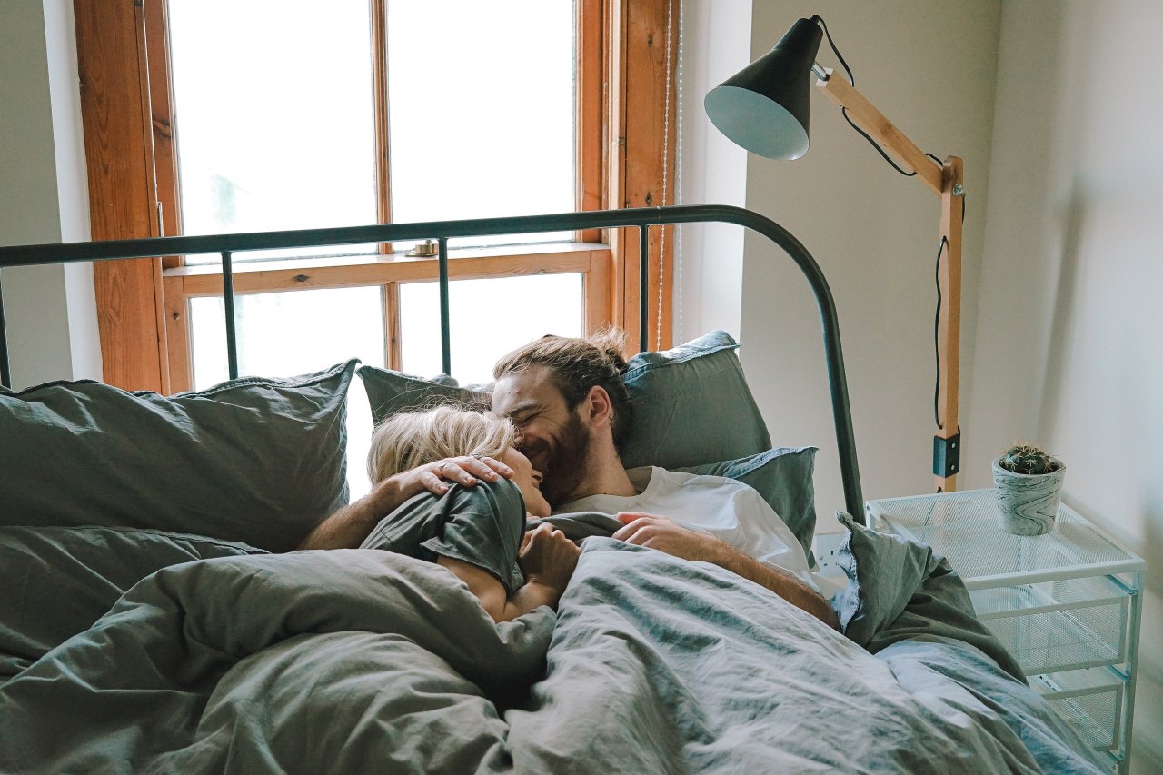 couple lounging in bed