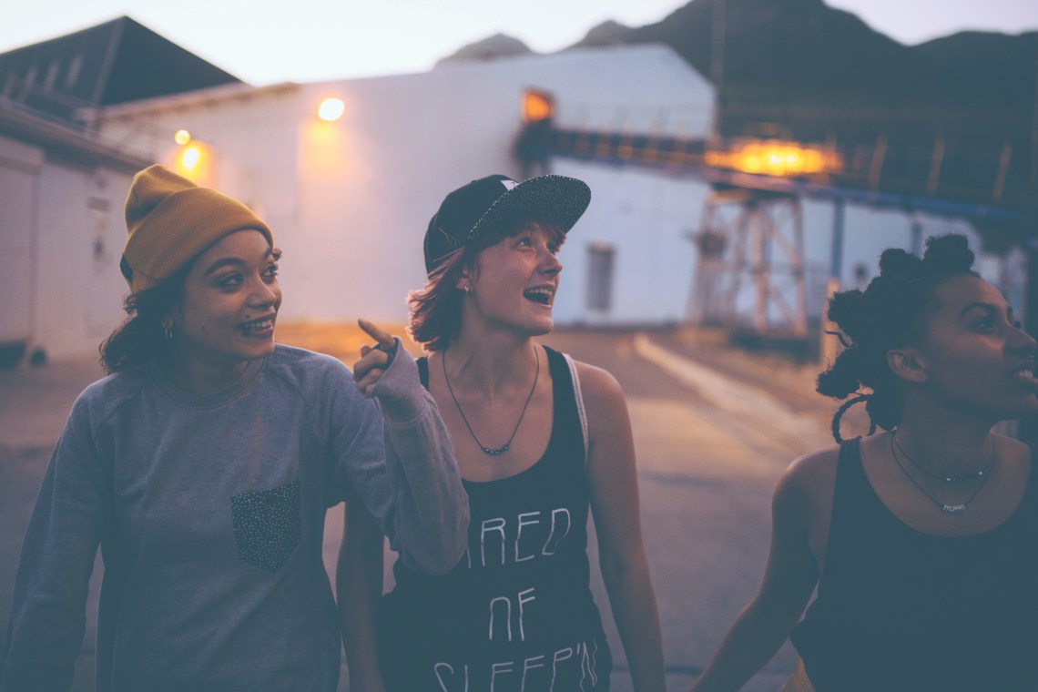 girl friends having fun at dusk