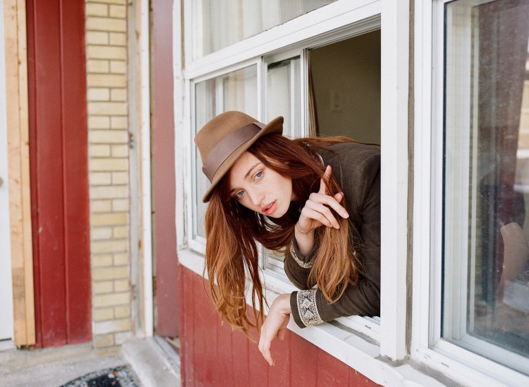 girl looking out window