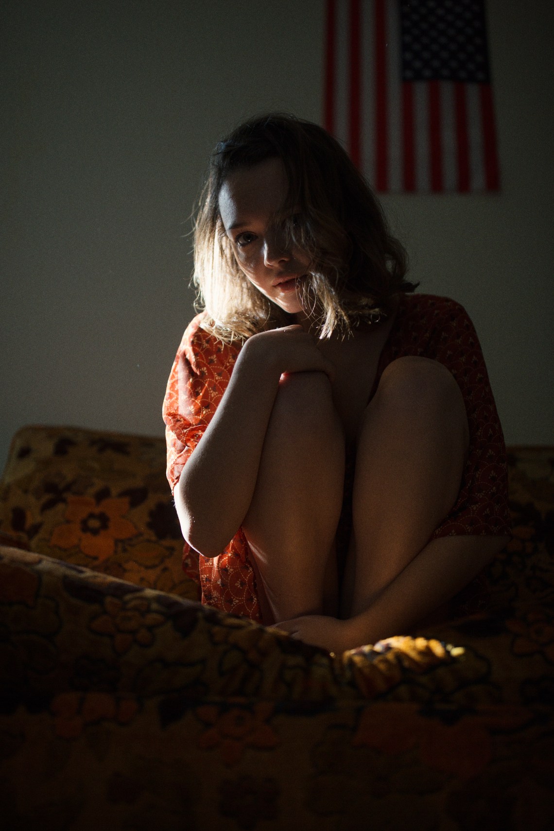 woman sitting on couch