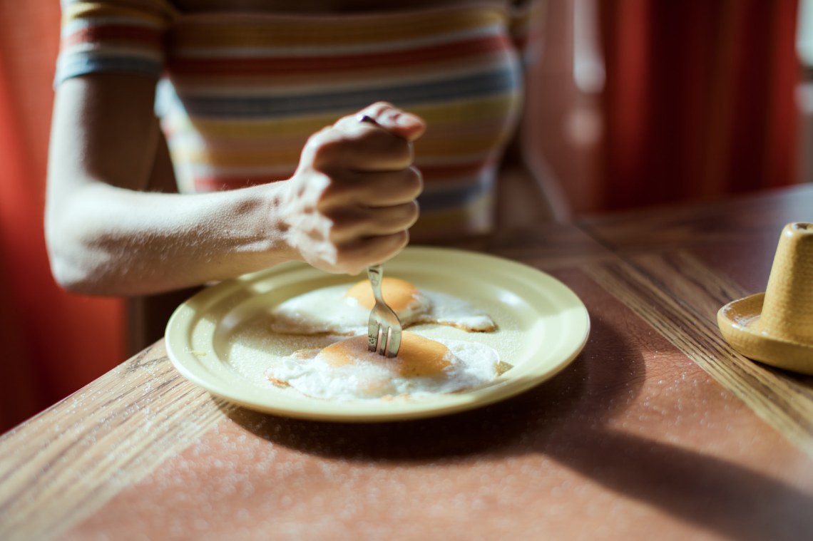 fork in an egg stabbing