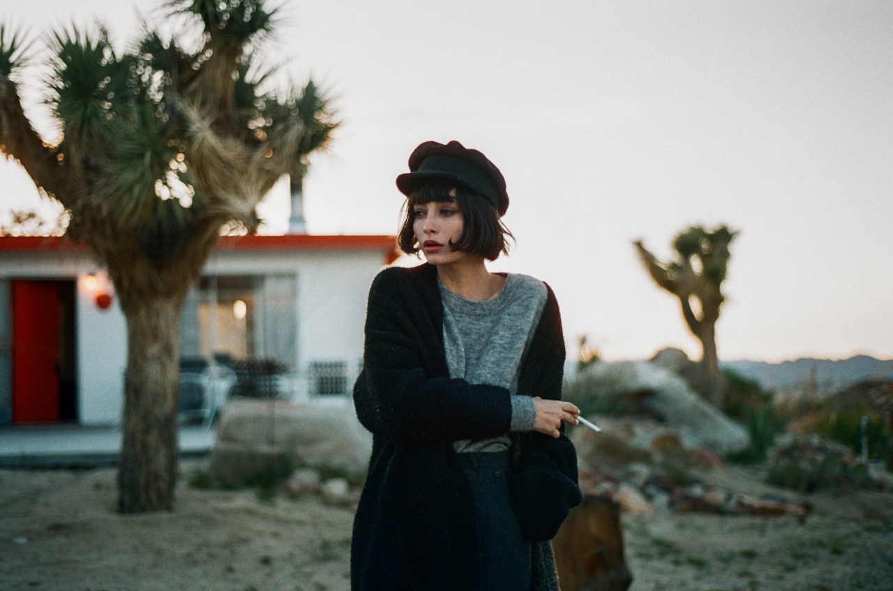 smoking hat black short hair palm trees