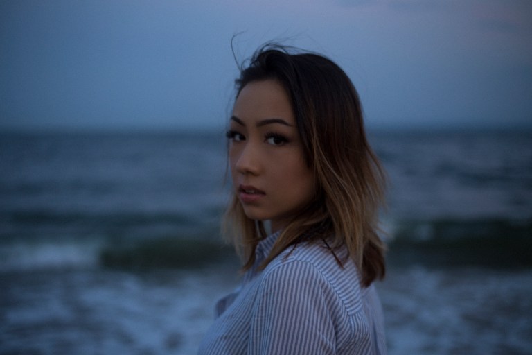 woman standing on beach