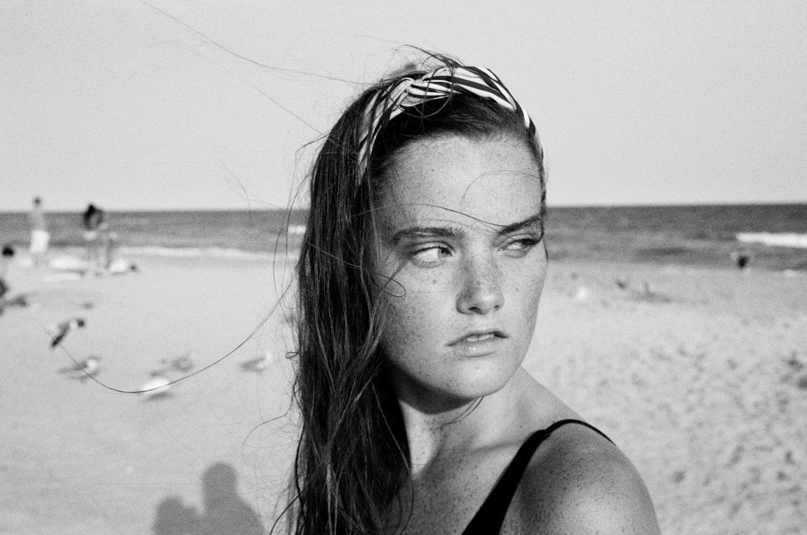 woman standing on beach