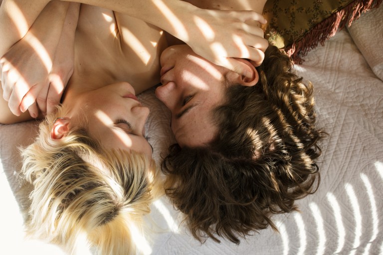 couple embracing in bed