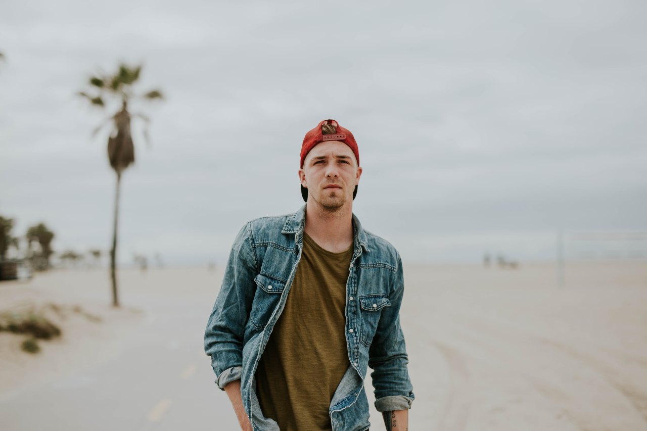 guy walking on beach