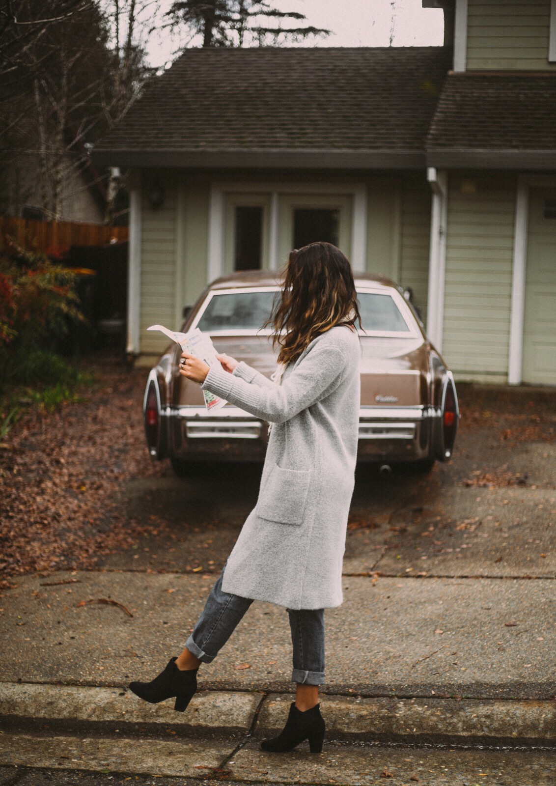 woman walking along curb