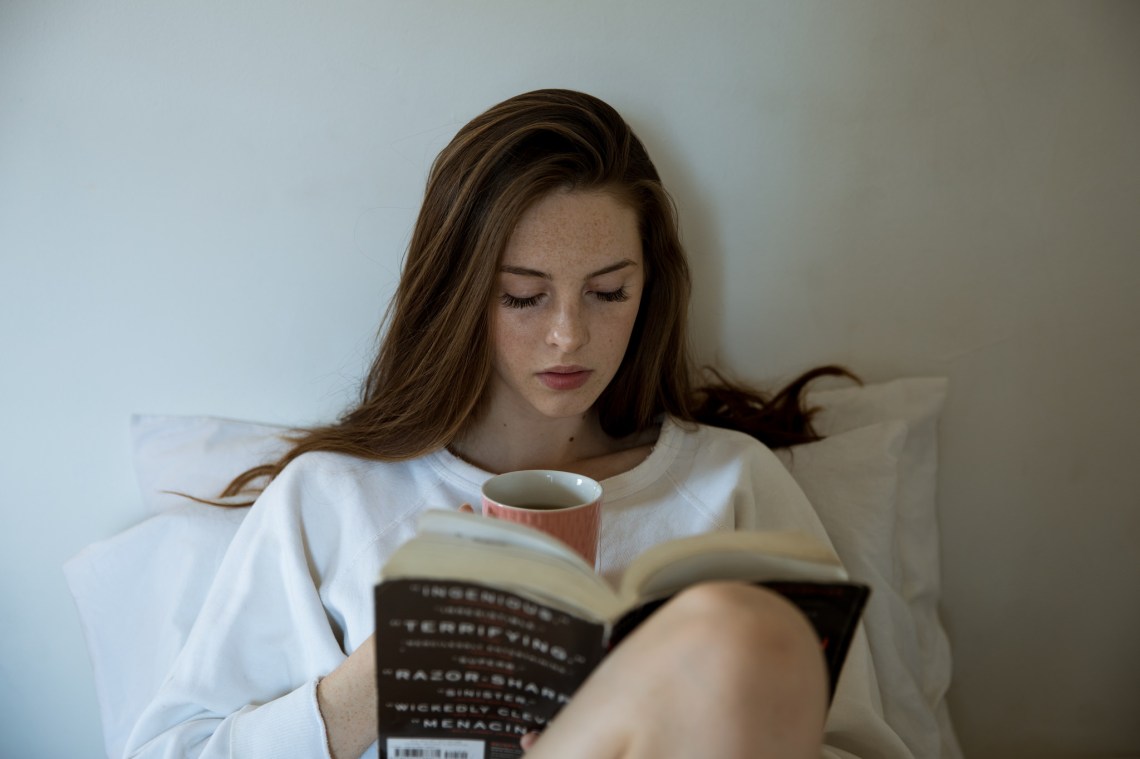 girl reading a book