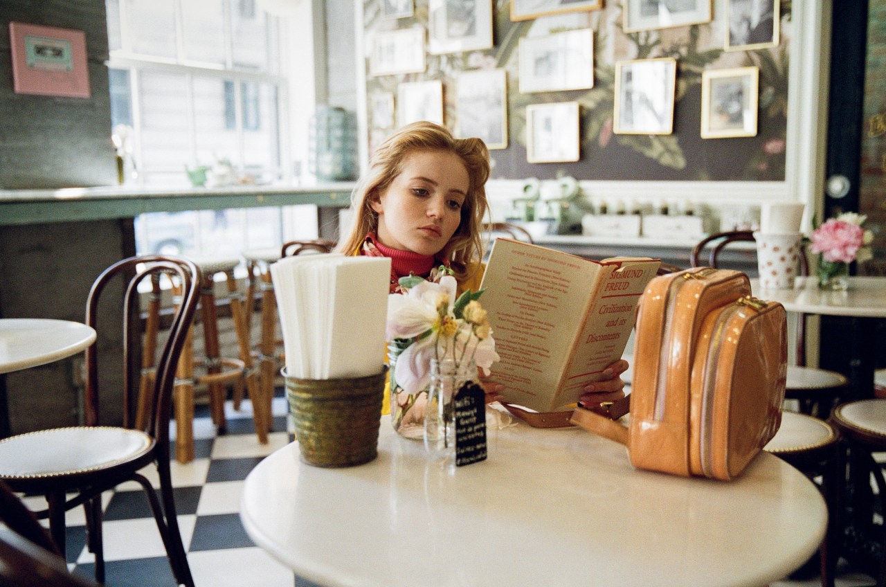 woman reading by herself