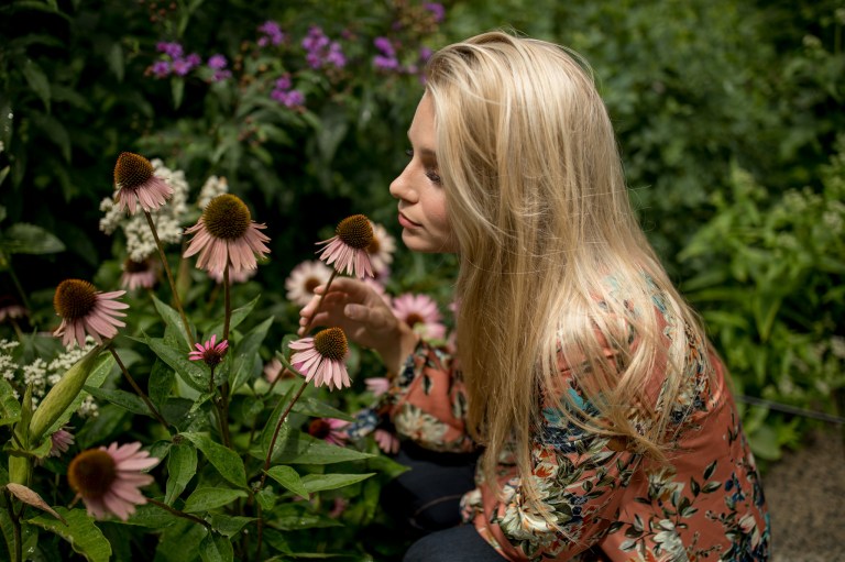 Girl with flowers in the spring