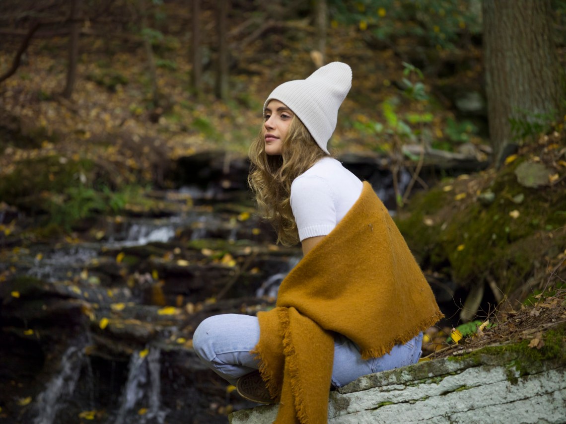 girl meditating in the woods