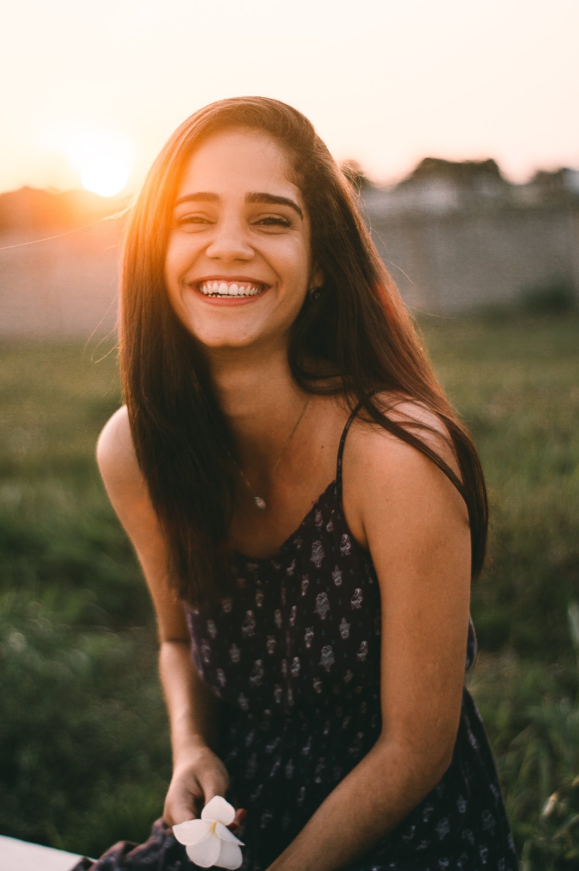 A classy, intelligent girl laughing 