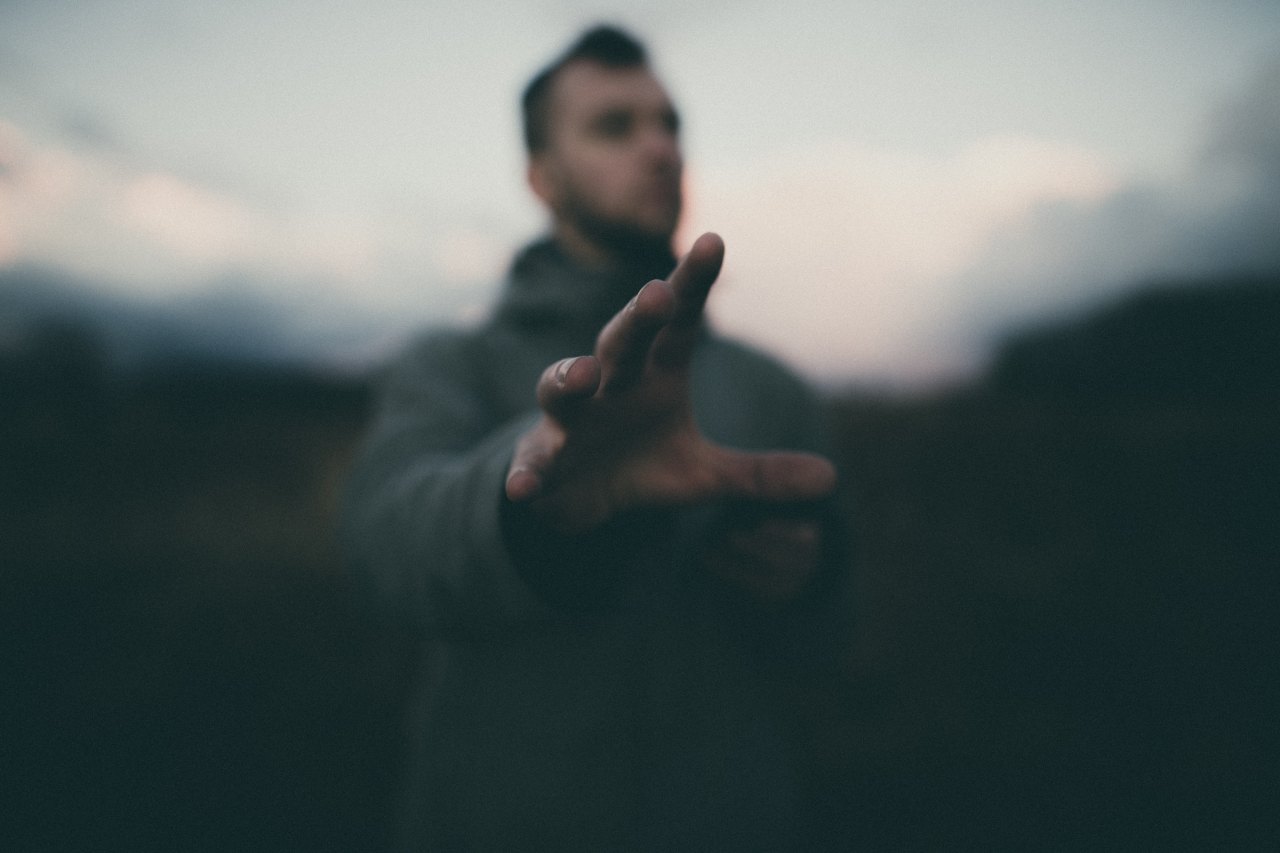 A creepy, blurry guy reaching out toward the camera