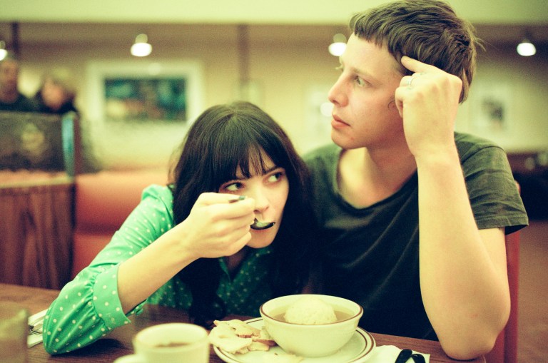 couple sharing meal at diner