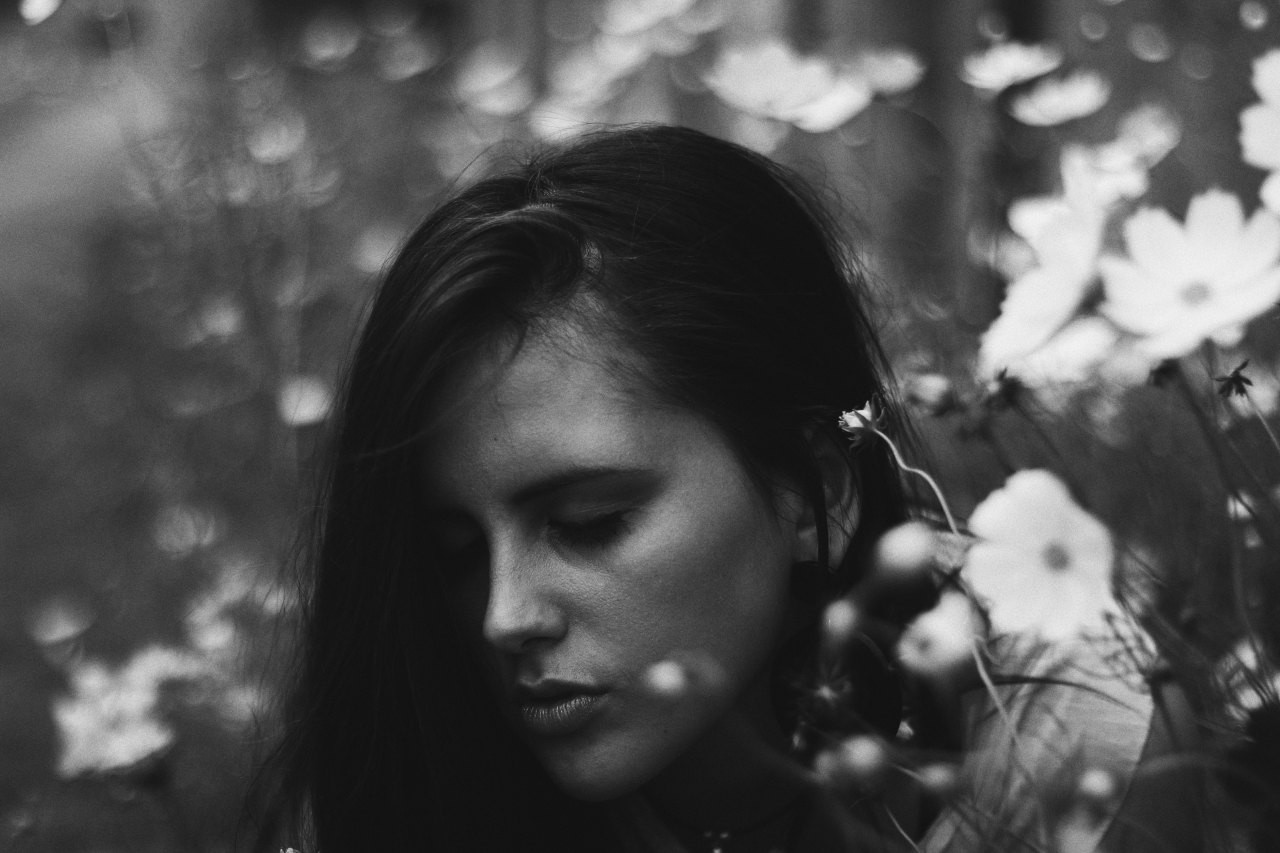 woman standing in flowers