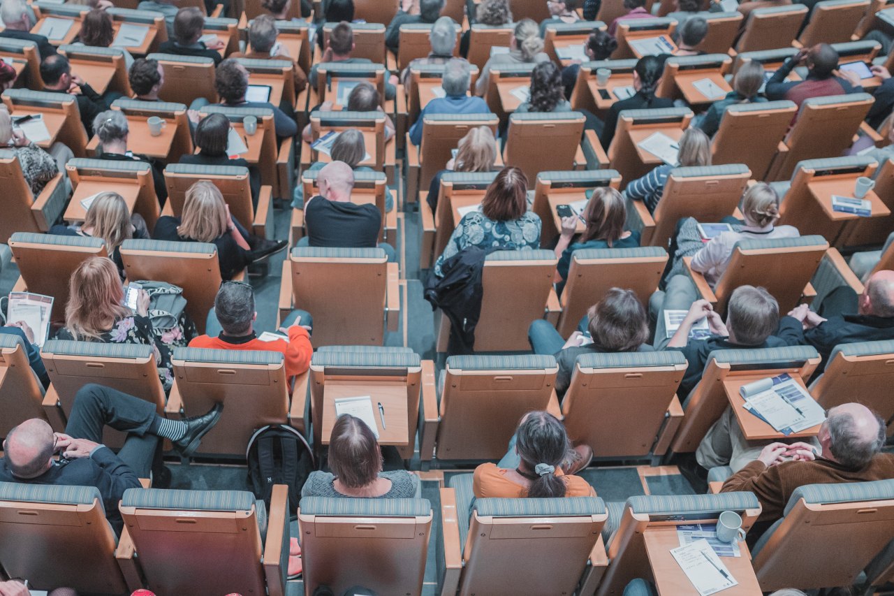 A lecture hall full of students during a class