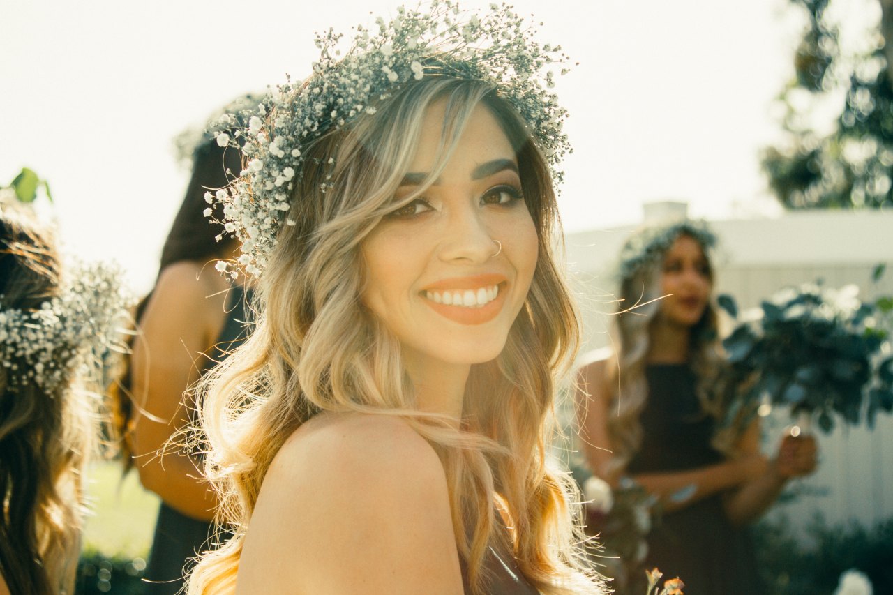 woman smiling in flower crown