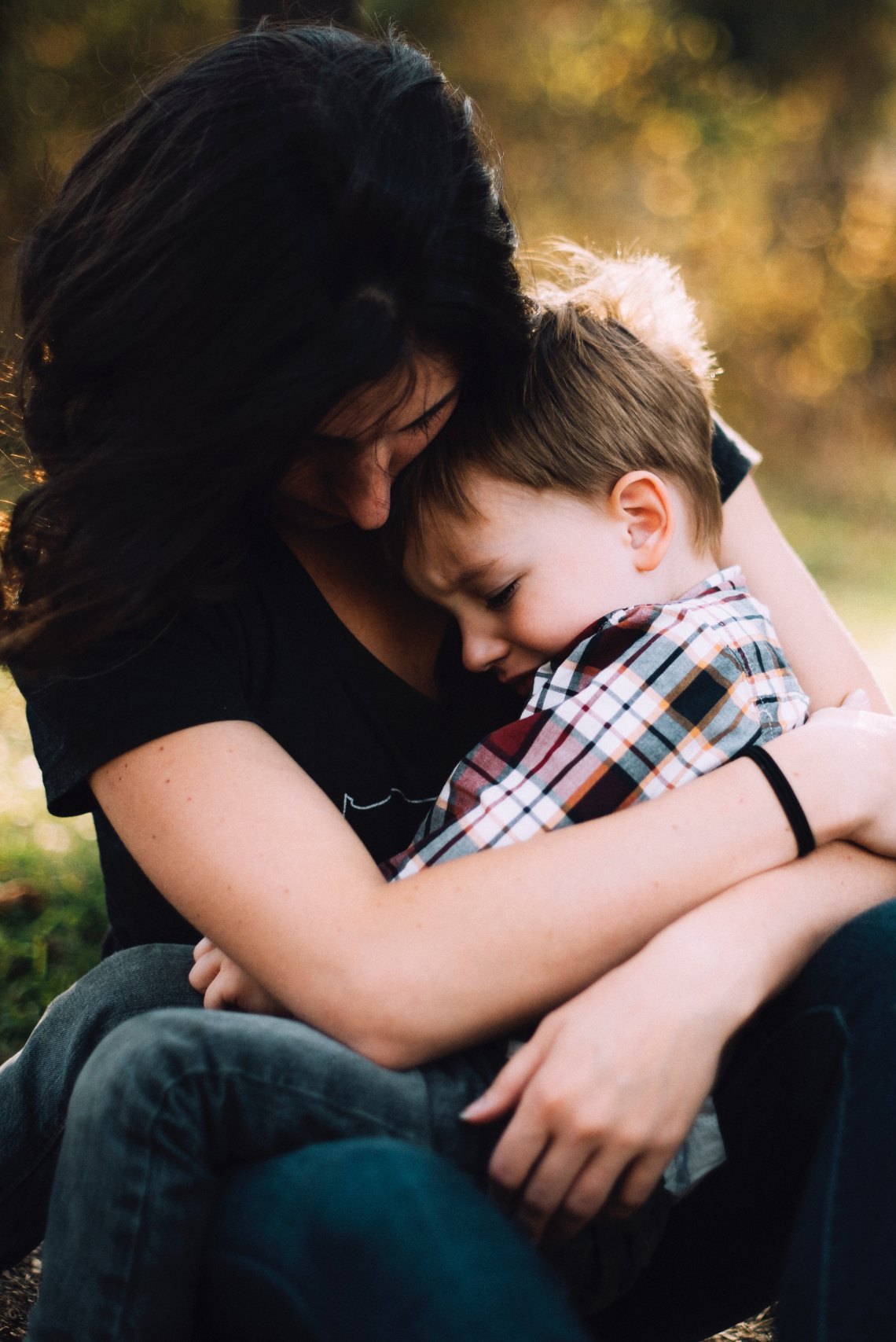 mother holding son