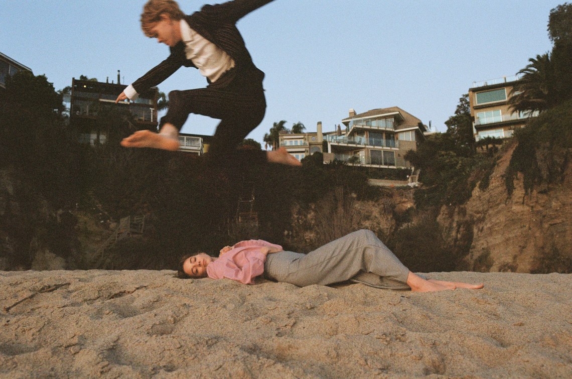 couple hanging out on beach