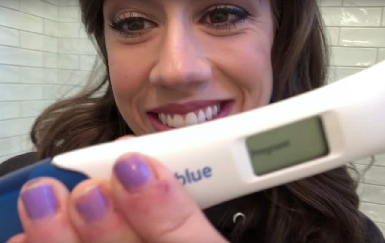 Colleen Ballinger with her pregnancy test