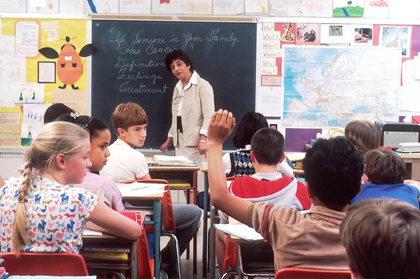 women standing in front of children photo